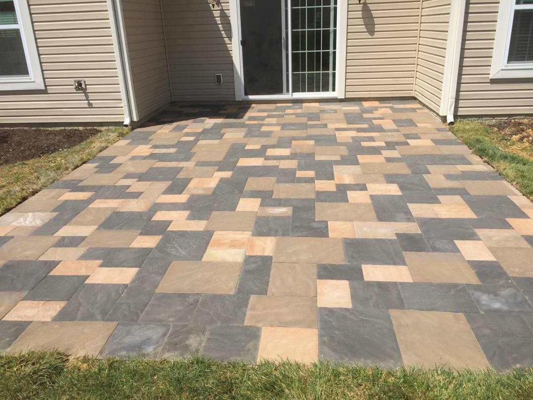 Multicolor Bristol stone paver patio outside a back door