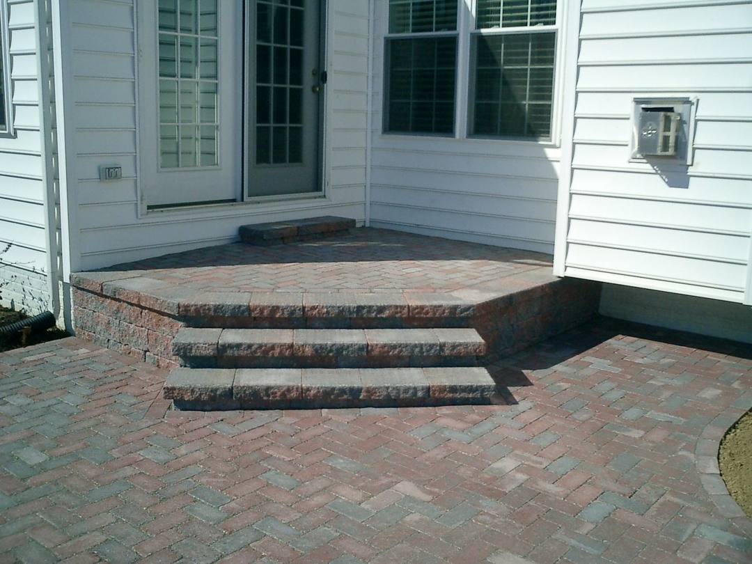 Paver landing and steps at a back door