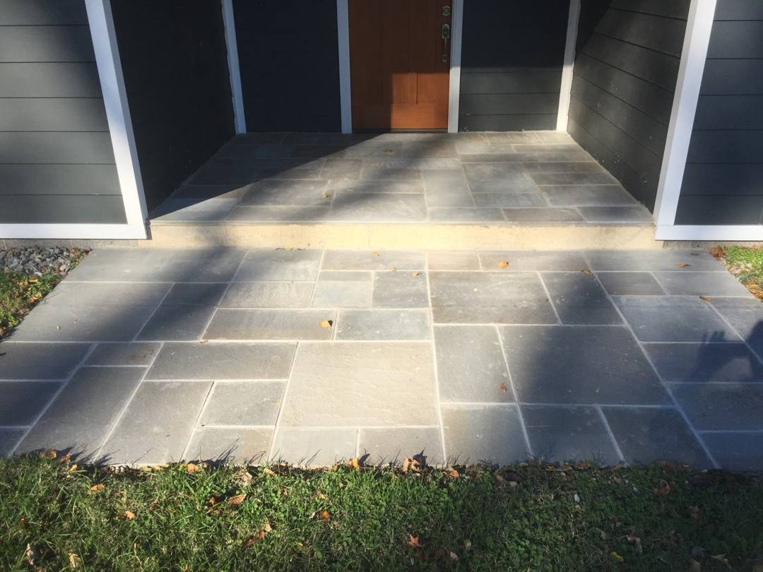 Bluestone flagstone landing at a home entry