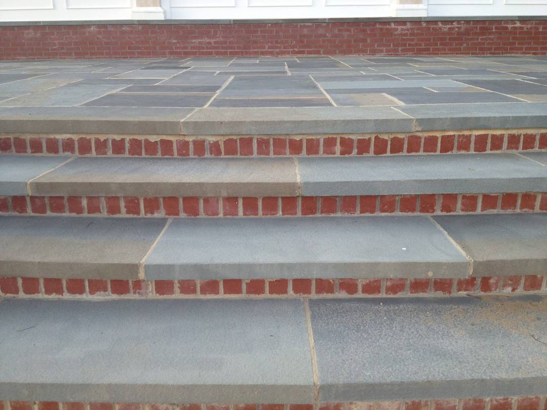 Close-up of bluestone treads and brick risers