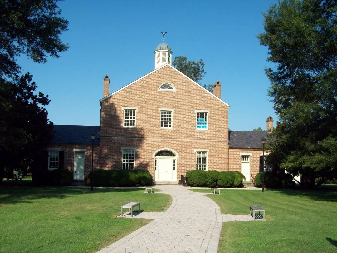 Historic brick Port Tobacco Courthouse with its brick walkway in Charles County, Maryland